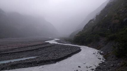 fog in the mountains, franz joseph glacier - south island, new zealand