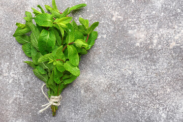 Fresh green mint on grey background