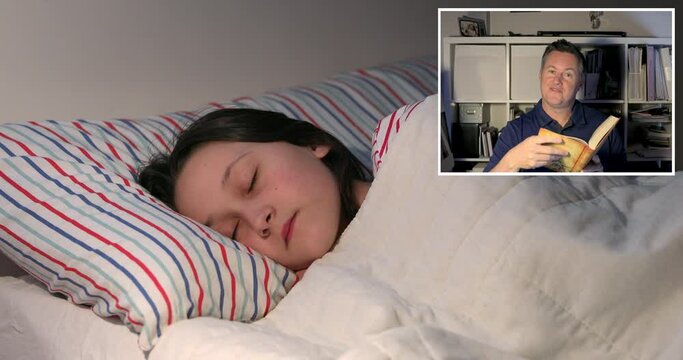 MS Father reading to daughter (10-11) lying in bed via video call / Florence, Tuscany, Italy