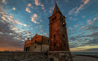 Fototapeta na wymiar Old Italian church on the Mediterranean coast.Caorle