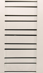 white painted wooden bar with slits abstract background