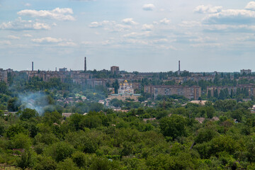 Fototapeta na wymiar Ukraine, Krivoy Rog, 16 of July 2020. Scenic city view from the hill. 