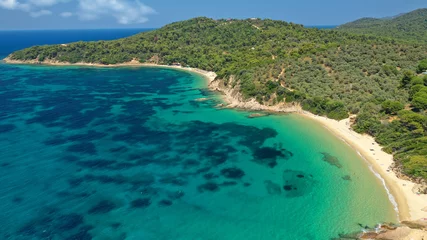 Foto op Plexiglas Aerial drone photo of paradise beaches of Banana and small Banana covered with pine trees in beautiful island of Skiathos, Sporades, Greece © aerial-drone