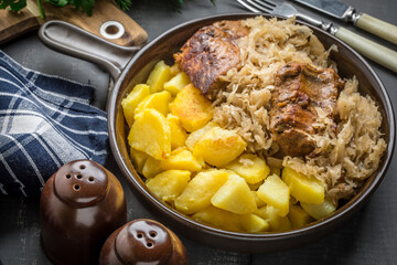 Fried ribs in sauerkraut.