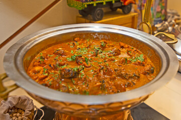 butter chicken curry in a buffet 