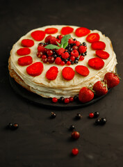 Pancakes with berries. Breakfast. Sweet homemade stack of pancakes