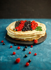 Pancakes. Stack of pancakes topped with berry jam. Breakfast.