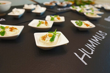 hummus in a small white bowl
