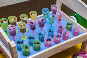 Buffet table with many different kids drinks