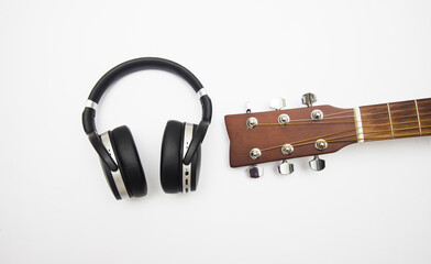 guitar fret board, and headphones isolated on white background.