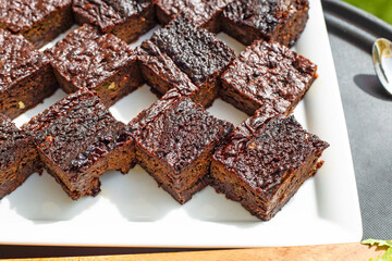 Brownie cake pieces in white plate