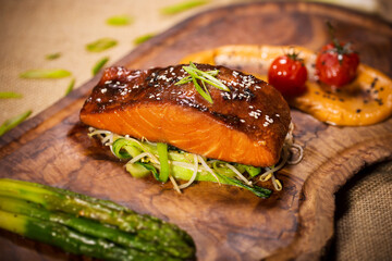 Grilled Salmon on a wooden board 