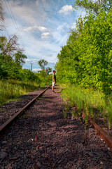 Ukraine, Krivoy Rog, the 16 of July 2020. Rarely used rail tracks near the town park.