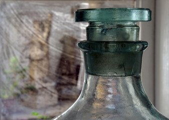 An empty large glass bottle ready to fill with young wine.  