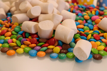 Different sweets decorating a beautiful party table.