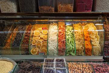 Group of colorful sun dried fruits on storefront display in Eminonu Bazaar.