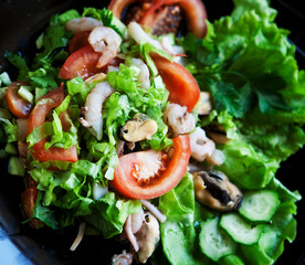 delicious salad with seafood close up picture