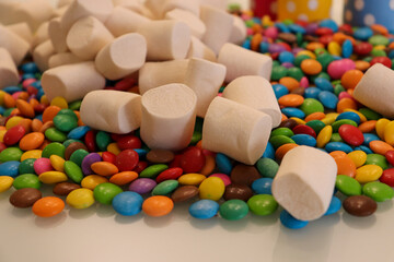 Different sweets decorating a beautiful party table.