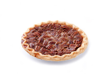 Fresh baked pecan pie isolated on white