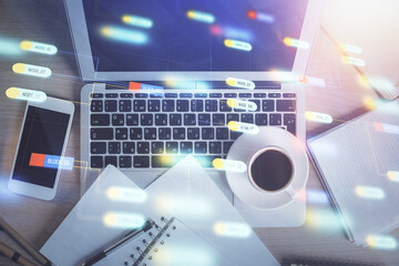 Multi exposure of data theme drawing hologram over topview work desk background with computer. Concept of technology.