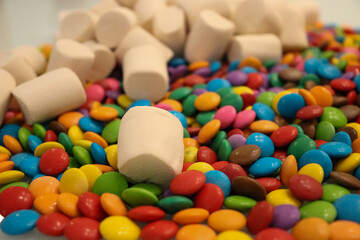 Different sweets decorating a beautiful party table.