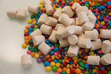Different sweets decorating a beautiful party table.