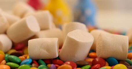 Different sweets decorating a beautiful party table.