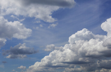 white fluffy clouds in the blue sky