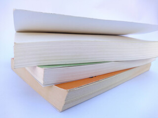 three books on white background