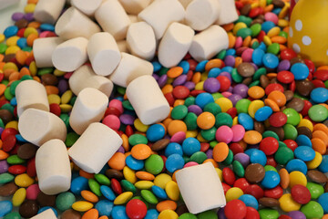 Different sweets decorating a beautiful party table.