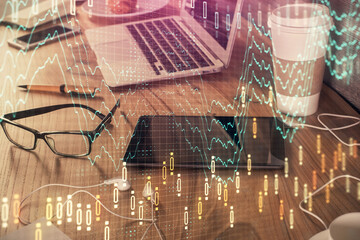 Double exposure of financial graph drawing and cell phone background. Concept of forex trading