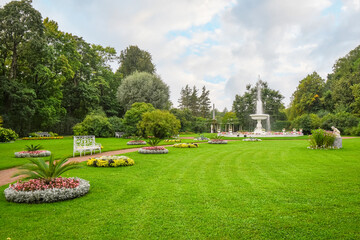 A peaceful garden with flowers, water fountain and bench near Catherine's Garden and Palace at...