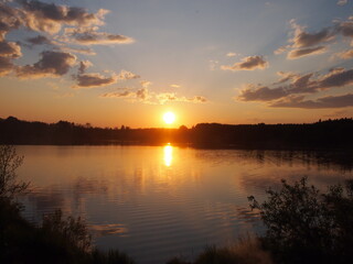 Fototapeta na wymiar Sunset on lake in Russia