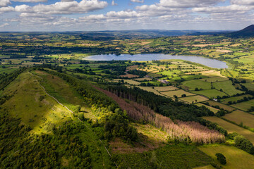 Fototapeta na wymiar Aerial view of a lake and farmland