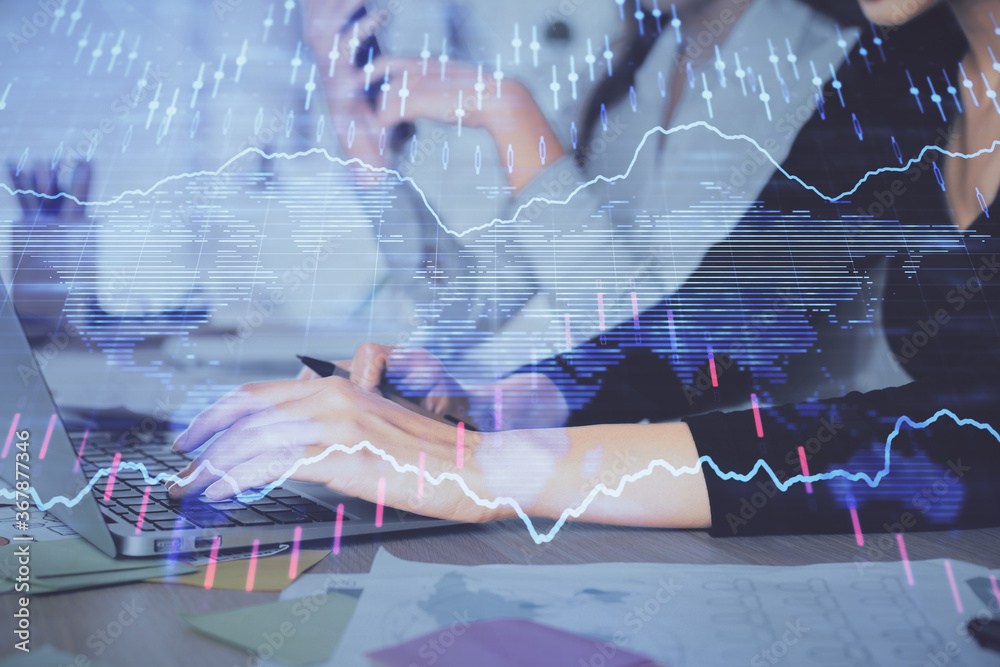 Poster multi exposure of woman hands typing on computer and financial graph hologram drawing. stock market 