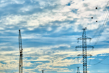 Obraz premium high-voltage power line against the blue sky. general plan. color