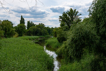 Ukraine, Krivoy Rog, the 16 of July 2020. Abandoned city park with beautiful clouds in the sky.
