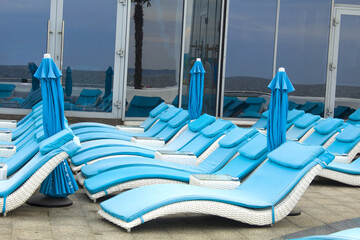 Beach chairs with umbrella on the beach