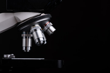 Fototapeta na wymiar close-up microscope isolated on black background