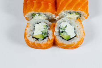 Sushi rolls philadelphia classic with fresh salmon and cream cheese. Japanese traditional food