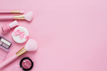 Obraz na płótnie Canvas ピンクのコスメ　化粧品の背景素材