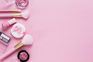 Obraz na płótnie Canvas ピンクのコスメ　化粧品の背景素材
