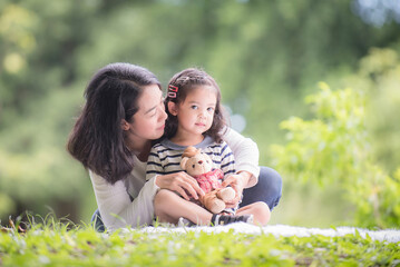 Portrait girl child and mother woman