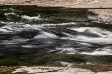 water flowing over rocks