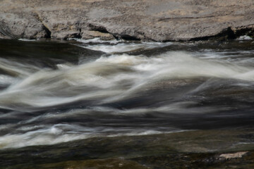 water flowing over rocks