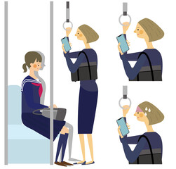 電車でスマートフォンを見る女性