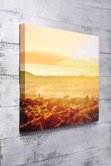 Canvas print on grey wooden background. Stretched canvas, gallery wrap