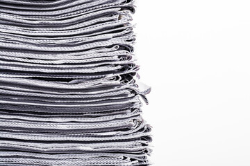 Closeup of stack of newspapers
