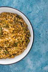 plant-based food, vegan rice and toasted farro with turmeric and vegetables
