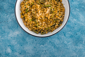 plant-based food, vegan rice and toasted farro with turmeric and vegetables
